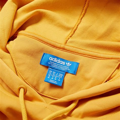 adidas tactile yellow tape hoody.